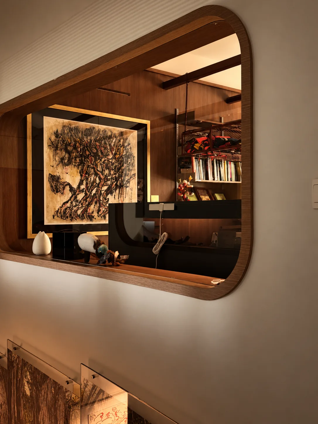 Library for the Arborist: a rounded opening in a white wall, looking into the timber-lined room and its tree painting