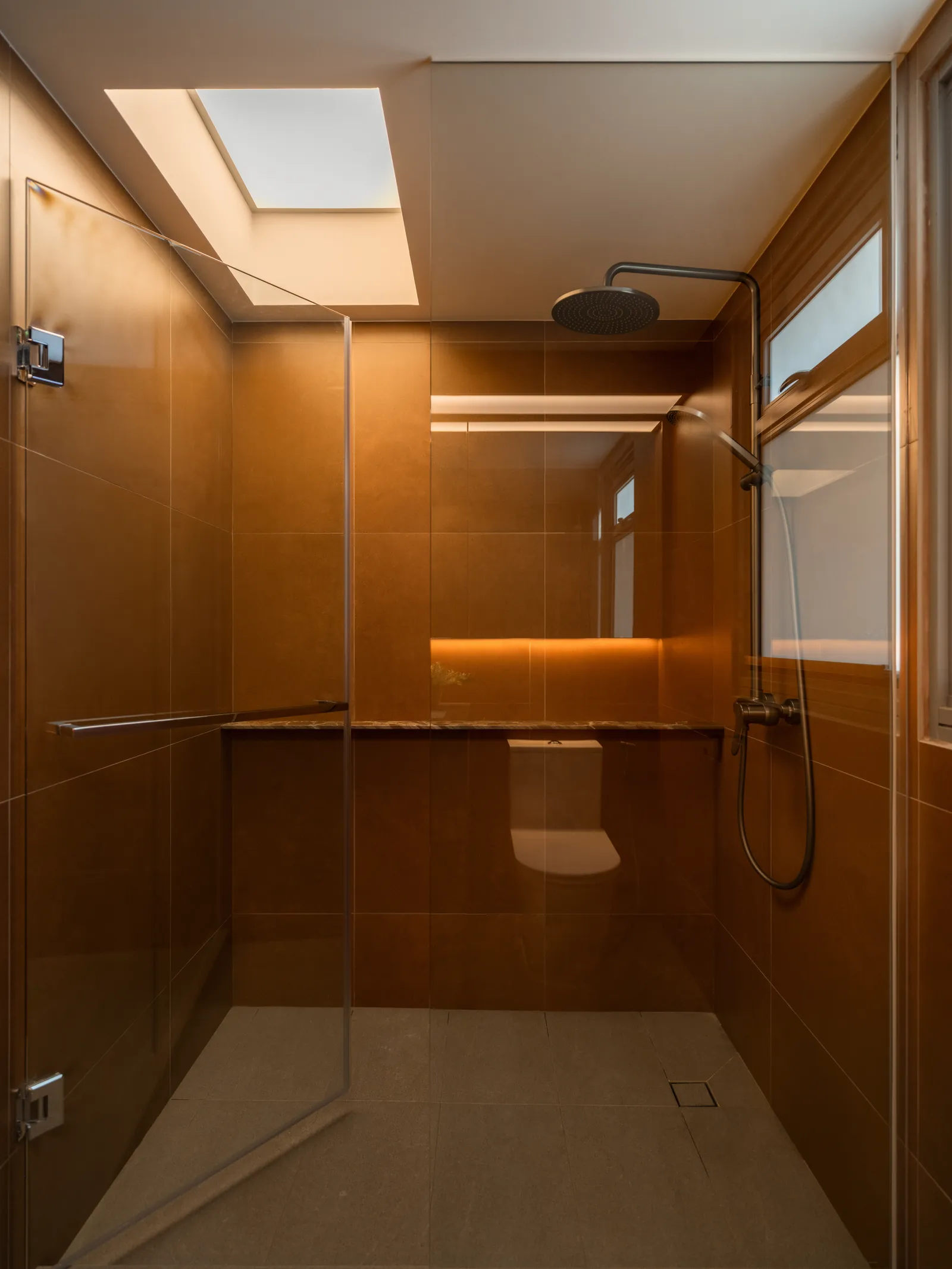 Mid Century Sanctuary: walk-in shower under a glowing ceiling panel that reads as filtered daylight